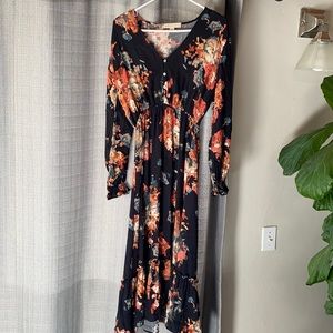 Floral print dress. Long sleeve. Brand is-LoveStitch. Size small